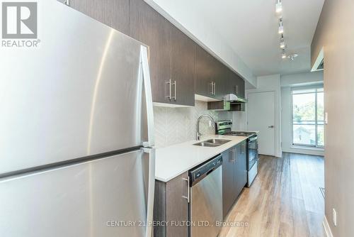 409 - 1 Falaise Road, Toronto, ON - Indoor Photo Showing Kitchen With Double Sink With Upgraded Kitchen