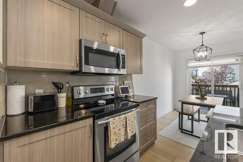 542 Chappelle Dr Sw, Edmonton, AB - Indoor Photo Showing Kitchen With Stainless Steel Kitchen