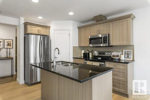 542 Chappelle Dr Sw, Edmonton, AB - Indoor Photo Showing Kitchen With Stainless Steel Kitchen With Double Sink