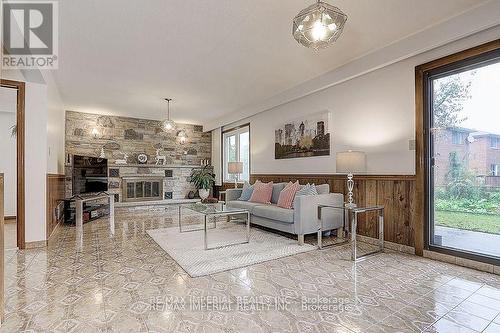 299 Huntsmill Boulevard, Toronto, ON - Indoor Photo Showing Living Room With Fireplace