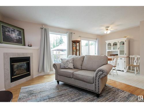 9144 165 Av Nw, Edmonton, AB - Indoor Photo Showing Living Room With Fireplace