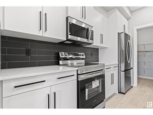 737 Mattson Drive Sw Sw, Edmonton, AB - Indoor Photo Showing Kitchen With Stainless Steel Kitchen