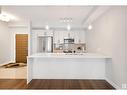 #108 625 Leger Wy Nw, Edmonton, AB  - Indoor Photo Showing Kitchen With Upgraded Kitchen 