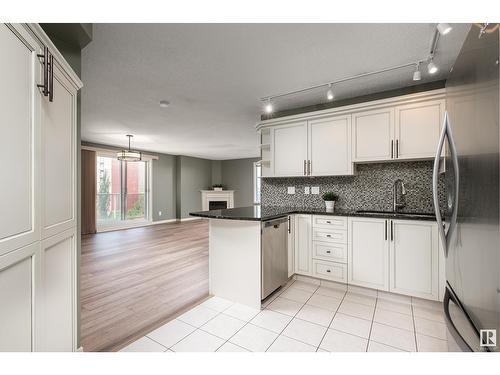 #703 9741 110 St Nw, Edmonton, AB - Indoor Photo Showing Kitchen With Upgraded Kitchen