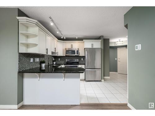 #703 9741 110 St Nw, Edmonton, AB - Indoor Photo Showing Kitchen