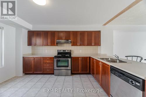 145 - 3050 Erin Centre Boulevard, Mississauga, ON - Indoor Photo Showing Kitchen With Double Sink