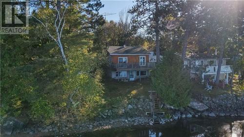 751 Rock Point Lane, Round Lake Centre, ON - Outdoor With Body Of Water