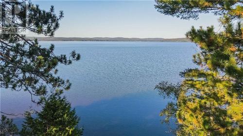 751 Rock Point Lane, Round Lake Centre, ON - Outdoor With Body Of Water With View