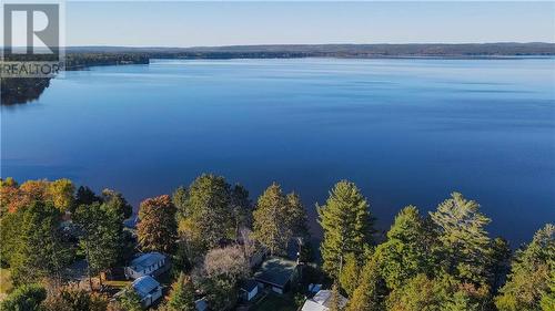 751 Rock Point Lane, Round Lake Centre, ON - Outdoor With Body Of Water With View