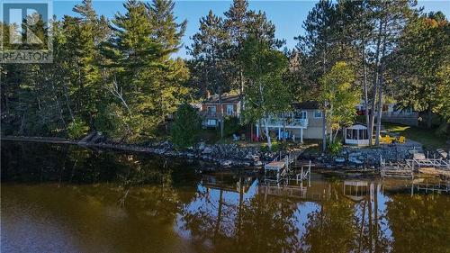 751 Rock Point Lane, Round Lake Centre, ON - Outdoor With Body Of Water