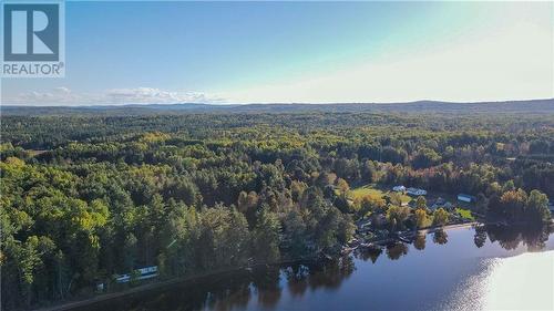 751 Rock Point Lane, Round Lake Centre, ON - Outdoor With Body Of Water With View