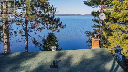 751 Rock Point Lane, Round Lake Centre, ON - Outdoor With Body Of Water With View