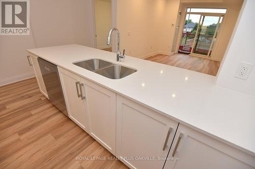 221 - 1936 Rymal Road E, Hamilton, ON - Indoor Photo Showing Kitchen With Double Sink