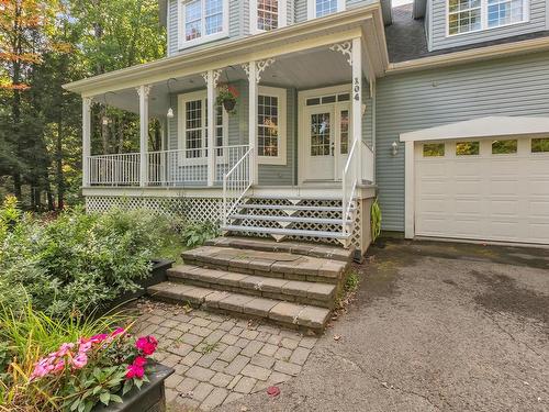 FaÃ§ade - 104 Ch. Du Roi, Saint-Colomban, QC - Outdoor With Deck Patio Veranda