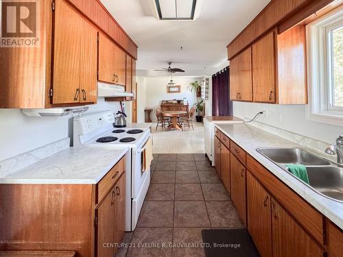 247 Raymond Street, Temiskaming Shores, ON - Indoor Photo Showing Kitchen With Double Sink