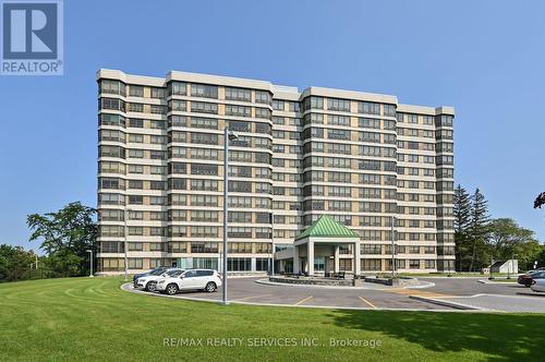 #212 - 320 Mill Street S, Brampton, ON - Outdoor With Facade