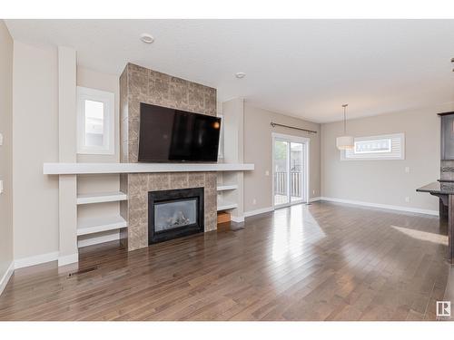 8815 218 St Nw, Edmonton, AB - Indoor Photo Showing Living Room With Fireplace