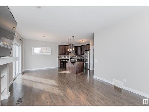 8815 218 St Nw, Edmonton, AB - Indoor Photo Showing Living Room With Fireplace