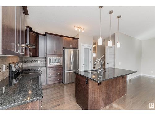 8815 218 St Nw, Edmonton, AB - Indoor Photo Showing Kitchen With Stainless Steel Kitchen With Double Sink With Upgraded Kitchen