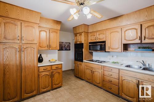 16045 95 Av Nw, Edmonton, AB - Indoor Photo Showing Kitchen With Double Sink