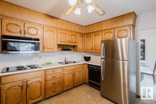 16045 95 Av Nw, Edmonton, AB - Indoor Photo Showing Kitchen With Double Sink