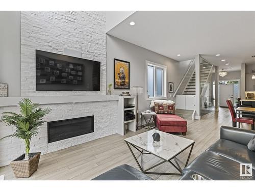 10107 138 St Nw, Edmonton, AB - Indoor Photo Showing Living Room With Fireplace