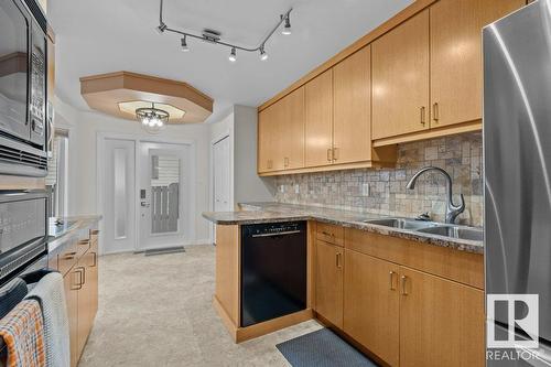 8011 159 Av Nw, Edmonton, AB - Indoor Photo Showing Kitchen With Double Sink