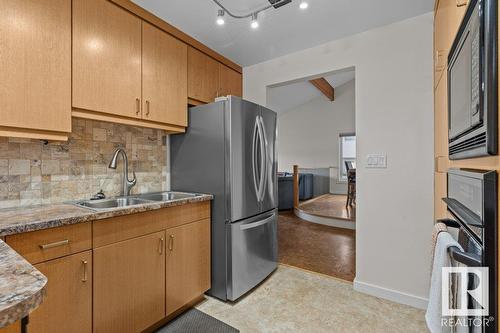 8011 159 Av Nw, Edmonton, AB - Indoor Photo Showing Kitchen With Double Sink