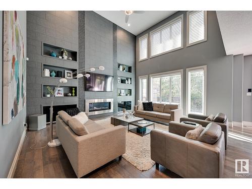 7526 May Cm Nw, Edmonton, AB - Indoor Photo Showing Living Room With Fireplace