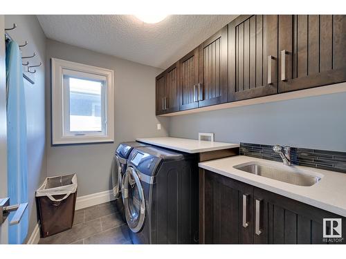 7526 May Cm Nw, Edmonton, AB - Indoor Photo Showing Laundry Room