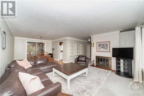 70 Rebecca Crescent, Ottawa, ON - Indoor Photo Showing Living Room With Fireplace