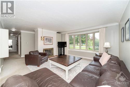 70 Rebecca Crescent, Ottawa, ON - Indoor Photo Showing Living Room With Fireplace