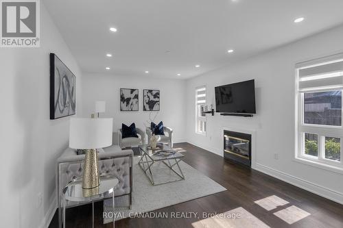 14 Sams Crescent, Brampton, ON - Indoor Photo Showing Living Room With Fireplace