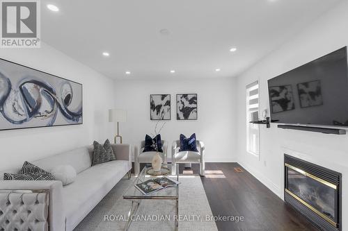 14 Sams Crescent, Brampton, ON - Indoor Photo Showing Living Room With Fireplace