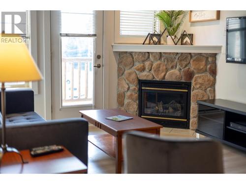 1500 Mcdonald  Avenue Unit# 307, Fernie, BC - Indoor Photo Showing Living Room With Fireplace