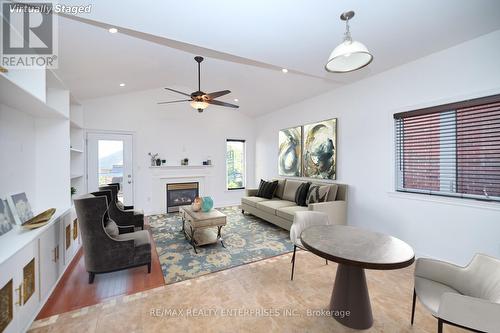 4085 Highland Park Drive, Lincoln, ON - Indoor Photo Showing Living Room With Fireplace