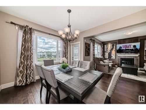 17103 122 St Nw, Edmonton, AB - Indoor Photo Showing Dining Room With Fireplace