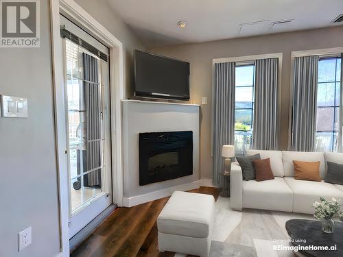 5052 Riverview  Road Unit# 4001A, Fairmont Hot Springs, BC - Indoor Photo Showing Living Room With Fireplace