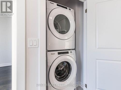 821 - 3200 William Coltson Avenue, Oakville, ON - Indoor Photo Showing Laundry Room