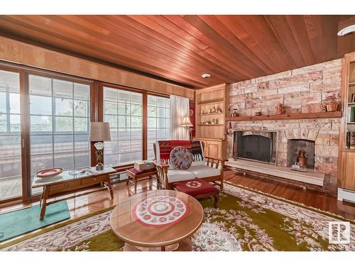 4422 Ada Bv Nw, Edmonton, AB - Indoor Photo Showing Living Room With Fireplace