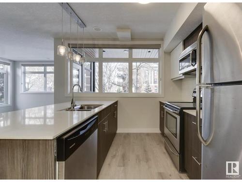 #201 10227 115 St Nw, Edmonton, AB - Indoor Photo Showing Kitchen With Stainless Steel Kitchen