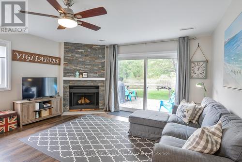 15 - 41 Laguna Parkway N, Ramara, ON - Indoor Photo Showing Living Room With Fireplace