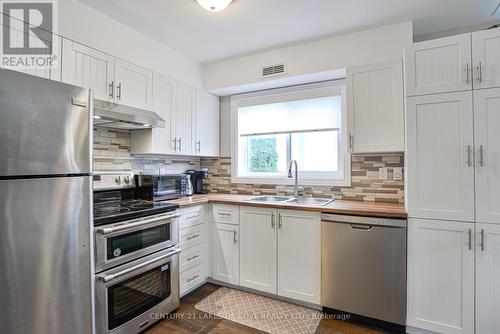 15 - 41 Laguna Parkway N, Ramara, ON - Indoor Photo Showing Kitchen With Double Sink