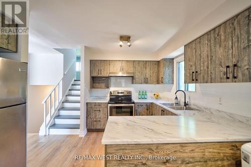 13 Skegby Road N, Brampton, ON - Indoor Photo Showing Kitchen With Double Sink