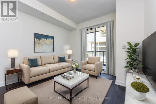 1112 - 3220 William Coltson Avenue, Oakville, ON - Indoor Photo Showing Living Room