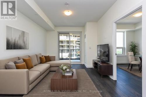 1112 - 3220 William Coltson Avenue, Oakville, ON - Indoor Photo Showing Living Room