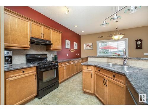 16532 61 St Nw, Edmonton, AB - Indoor Photo Showing Kitchen With Double Sink