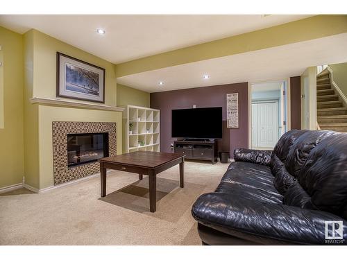 16532 61 St Nw, Edmonton, AB - Indoor Photo Showing Living Room With Fireplace