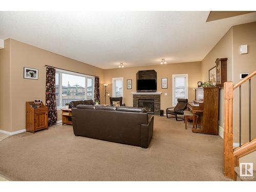 16532 61 St Nw, Edmonton, AB - Indoor Photo Showing Living Room With Fireplace