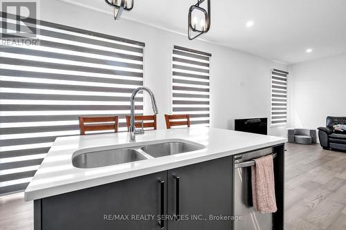 88 Poole Crescent, Middlesex Centre, ON - Indoor Photo Showing Kitchen With Double Sink